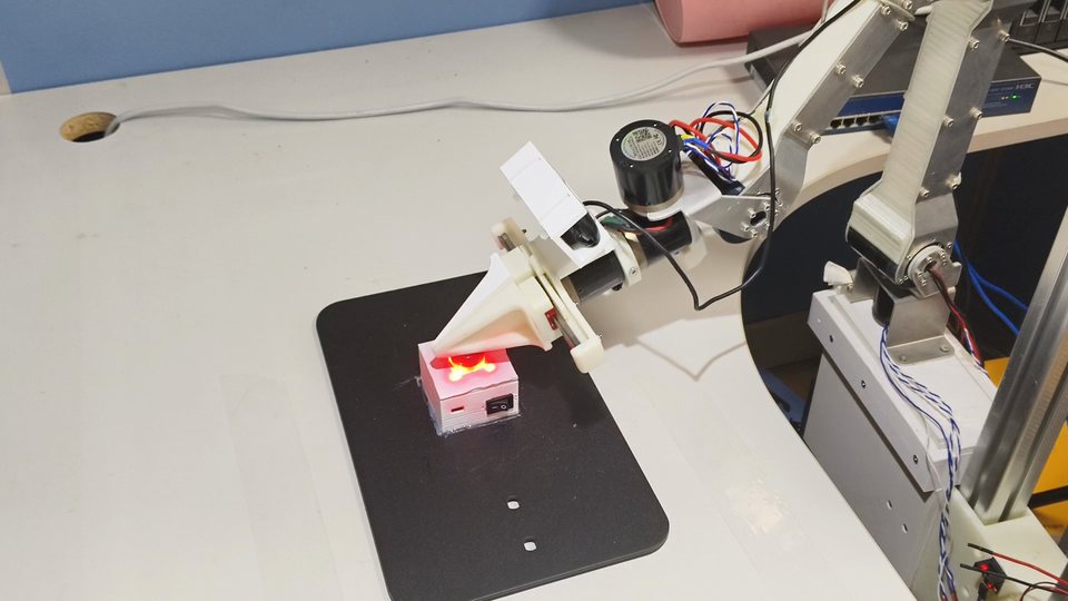 DIYRobot pressing an illuminated button